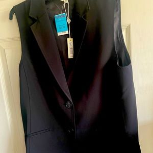 Black Vest, dressy, perfect for New Years. Sits below hip, super slimming